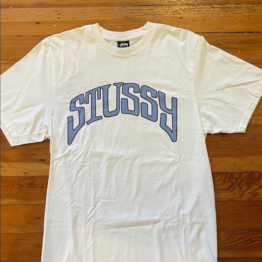 Stussy White Short Sleeve Tee with Light Blue Arch Logo